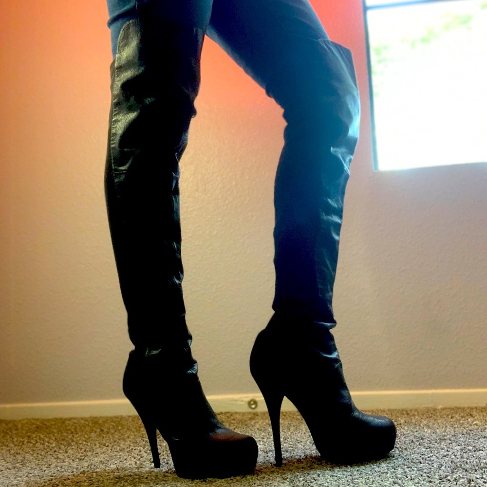 Black stiletto thigh high leather boots